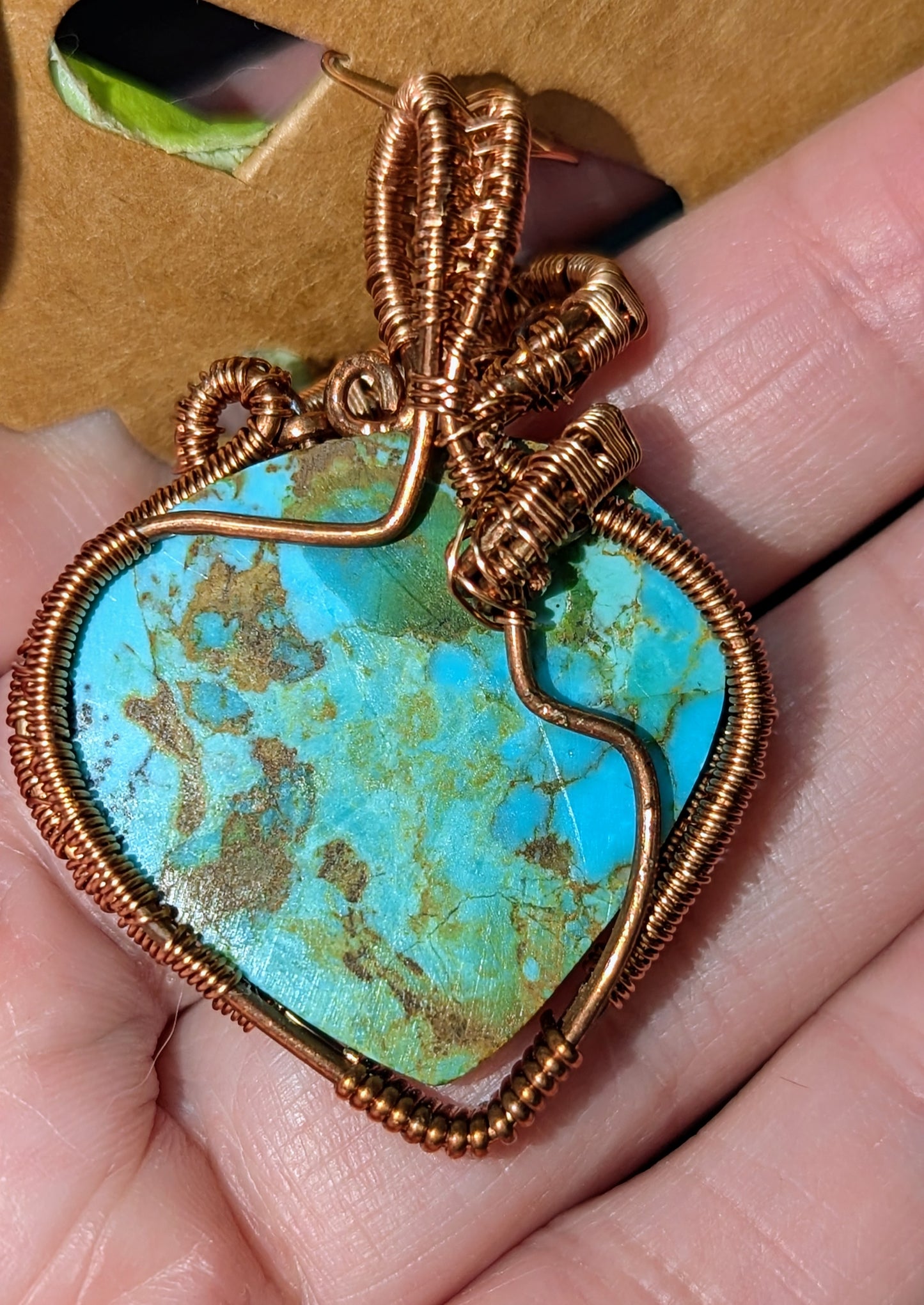 Kingman turquoise and copper woven pendant