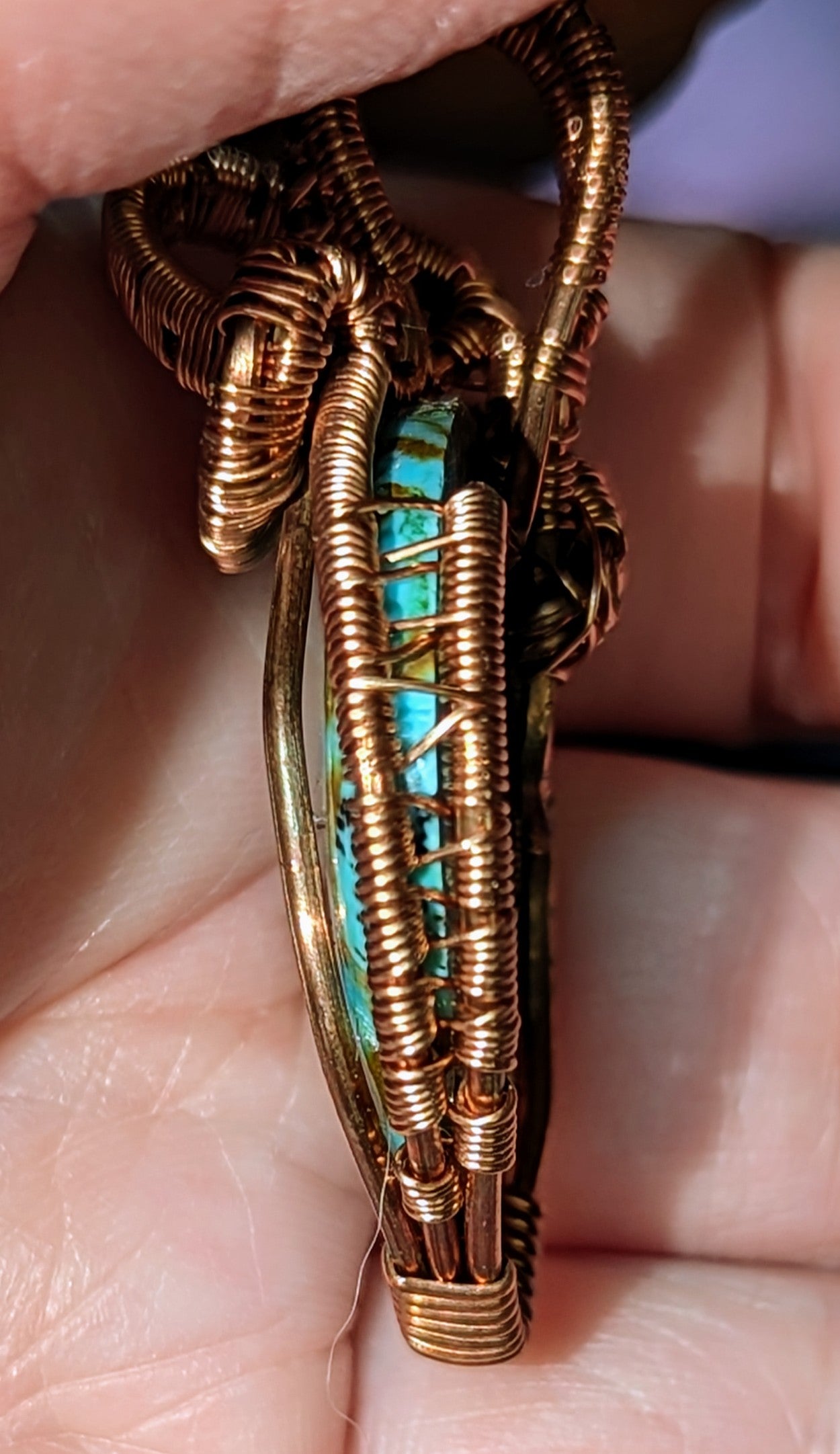 Kingman turquoise and copper woven pendant